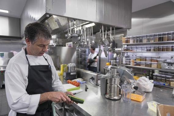 AIPM Venue - photo of chef preparing food in the kitchen