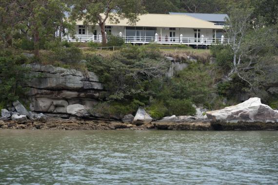 AIPM Venue - external photo of venue from across the water